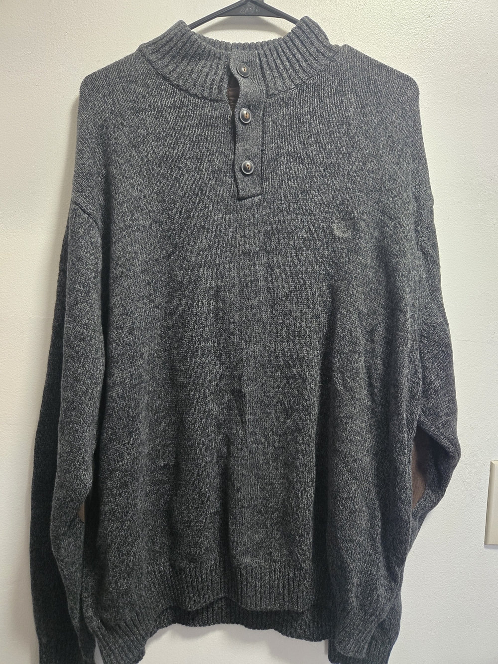 Chaps knit pullover sweater with a button-up mock neck and brown elbow patches.